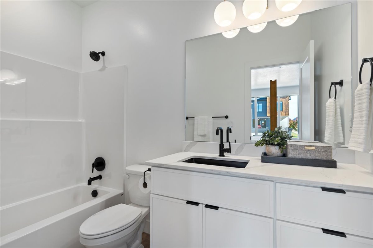 Full bath with tub / shower combination and vanity