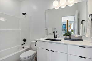 Full bath with tub / shower combination and vanity