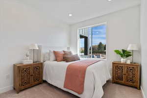 Bedroom featuring carpet floors and recessed lighting