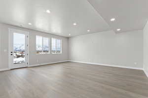 Unfurnished room featuring recessed lighting and light wood finished floors