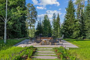 View of yard with a patio area