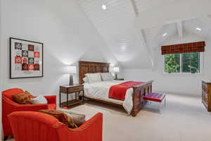 Carpeted bedroom featuring baseboards
