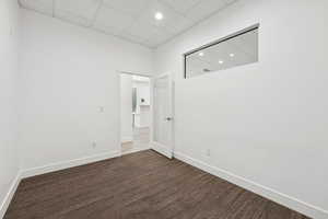 Unfurnished room featuring a paneled ceiling and recessed lighting