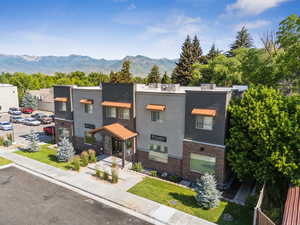 View of front facade with a mountain view and stucco siding
