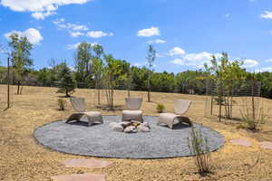 View of yard with a patio