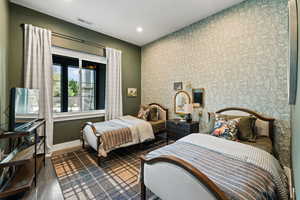 Bedroom featuring baseboards and recessed lighting