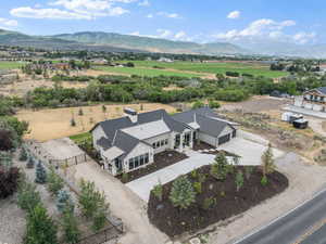 Aerial view of sparsely populated area with a mountain backdrop