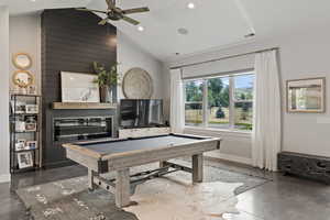 Playroom with billiards table, ceiling fan, high vaulted ceiling, recessed lighting, and concrete floors