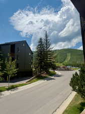 View of property with a mountain view
