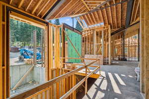 Misc room featuring lofted ceiling