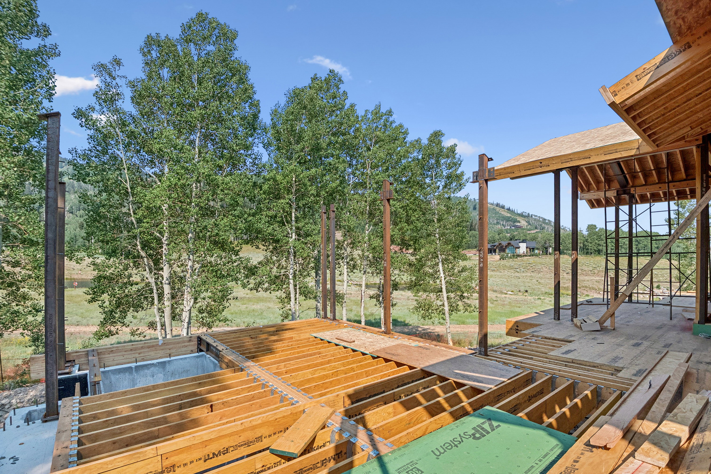 Wooden terrace featuring a mountain view