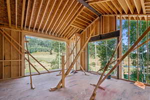 Misc room featuring lofted ceiling