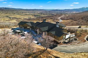 View of subject property with a mountain backdrop