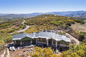 View of subject property with mountains