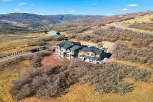 View from above of property with a mountainous background