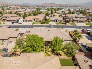Aerial view of residential area featuring mountains