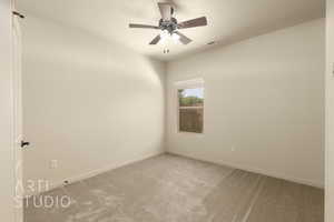 Unfurnished room with carpet floors and ceiling fan