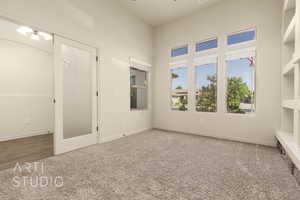 Unfurnished bedroom featuring carpet flooring and baseboards