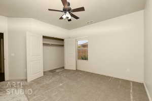 Unfurnished bedroom featuring carpet floors, a closet, a ceiling fan, and a textured ceiling