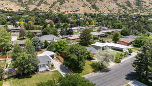 Aerial view of residential area featuring mountains