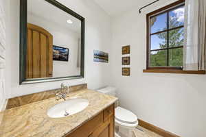 Bathroom featuring toilet and vanity