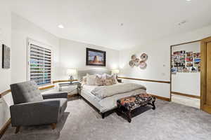 Bedroom featuring carpet flooring and recessed lighting