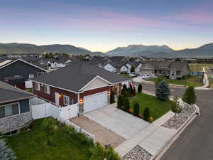 Aerial view at dusk of a residential view and a mountain view