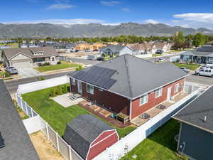 Aerial view of residential area featuring a mountain backdrop