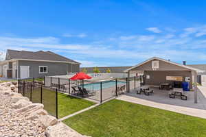 View of pool with a patio area