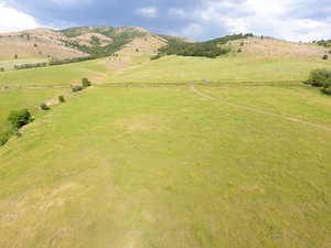 Overview of rural landscape with a mountain backdrop