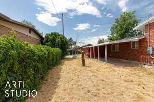 View of yard with a patio area