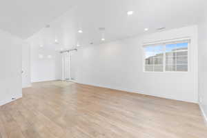 Spare room featuring recessed lighting and light wood finished floors