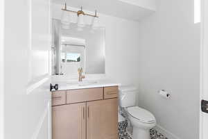 Bathroom featuring vanity and tile patterned floors