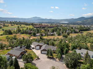 Aerial view of residential area with a mountainous background