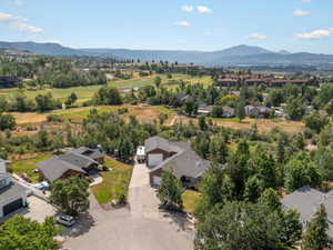 Aerial view of residential area featuring mountains