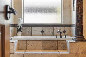 Bathroom featuring a garden tub