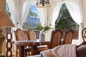 Dining space featuring plenty of natural light and hanging lights