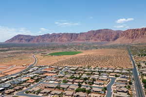 Aerial view of residential area with a mountainous background