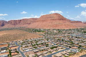 Aerial view of residential area with a mountainous background