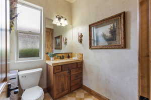 Half bath with toilet and vanity