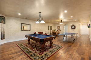 Rec room with recessed lighting, arched walkways, ceiling fan, billiards table, and dark wood-style flooring