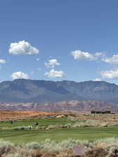 View of mountain backdrop featuring a golf course