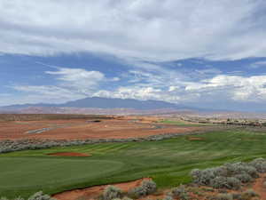Surrounding community featuring a mountain view and view of golf course