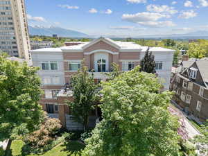 View of front facade featuring a mountain view and brick siding