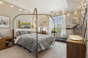 Bedroom with carpet and crown molding