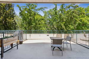 View of patio featuring view of scattered trees