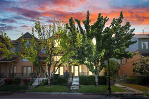 View of front facade with stucco siding