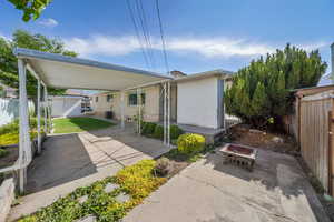 Rear view of property featuring a patio area