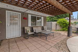 View of patio with a pergola