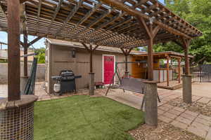 View of patio / terrace featuring a pergola and area for grilling